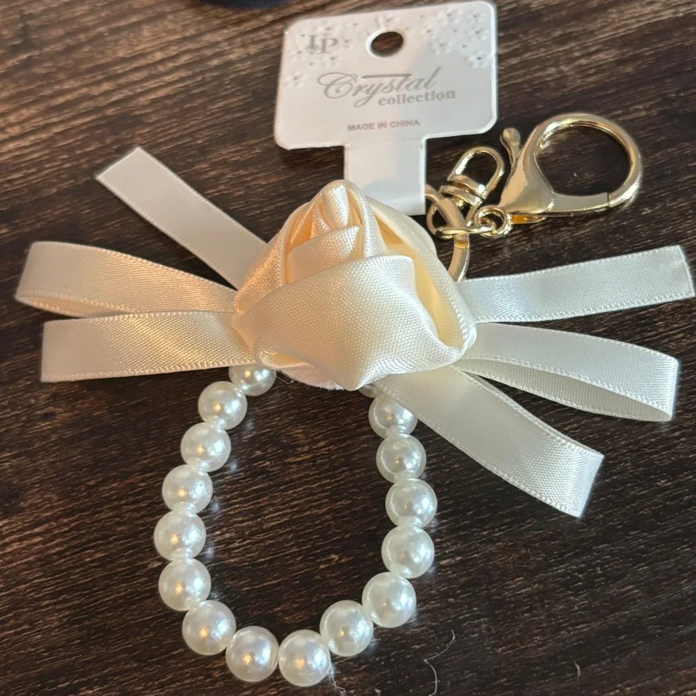Crystal Collection Ivory Satin Rose Faux Pearl Bow Keychain Gold Tone Clasp